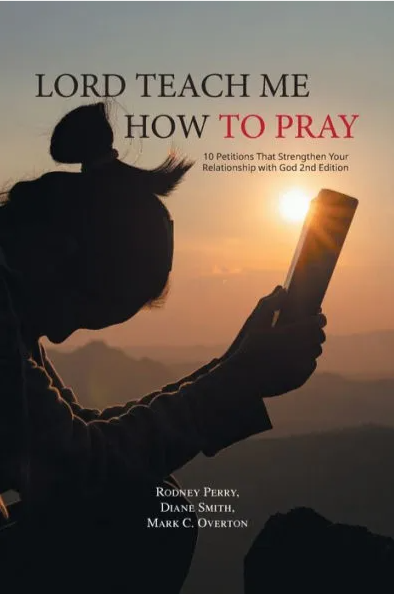 "Cover of 'Lord, Teach Me How to Pray' 2nd edition, featuring a silhouette of a person praying at sunset."