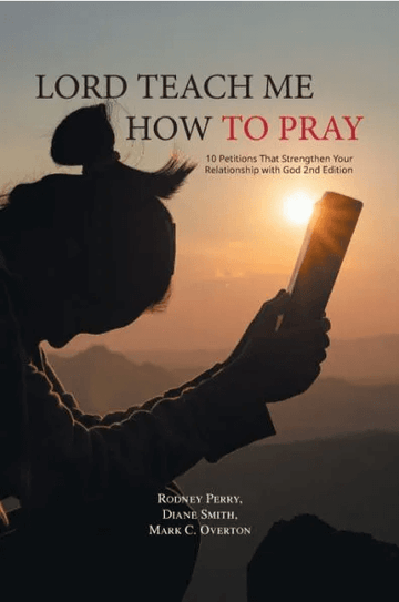 Book cover of "Lord Teach Me How to Pray" by Rodney Perry, Diane Smith, and Mark C. Overton, featuring a silhouette of a person with a book against a sunset background, focusing on prayer life.